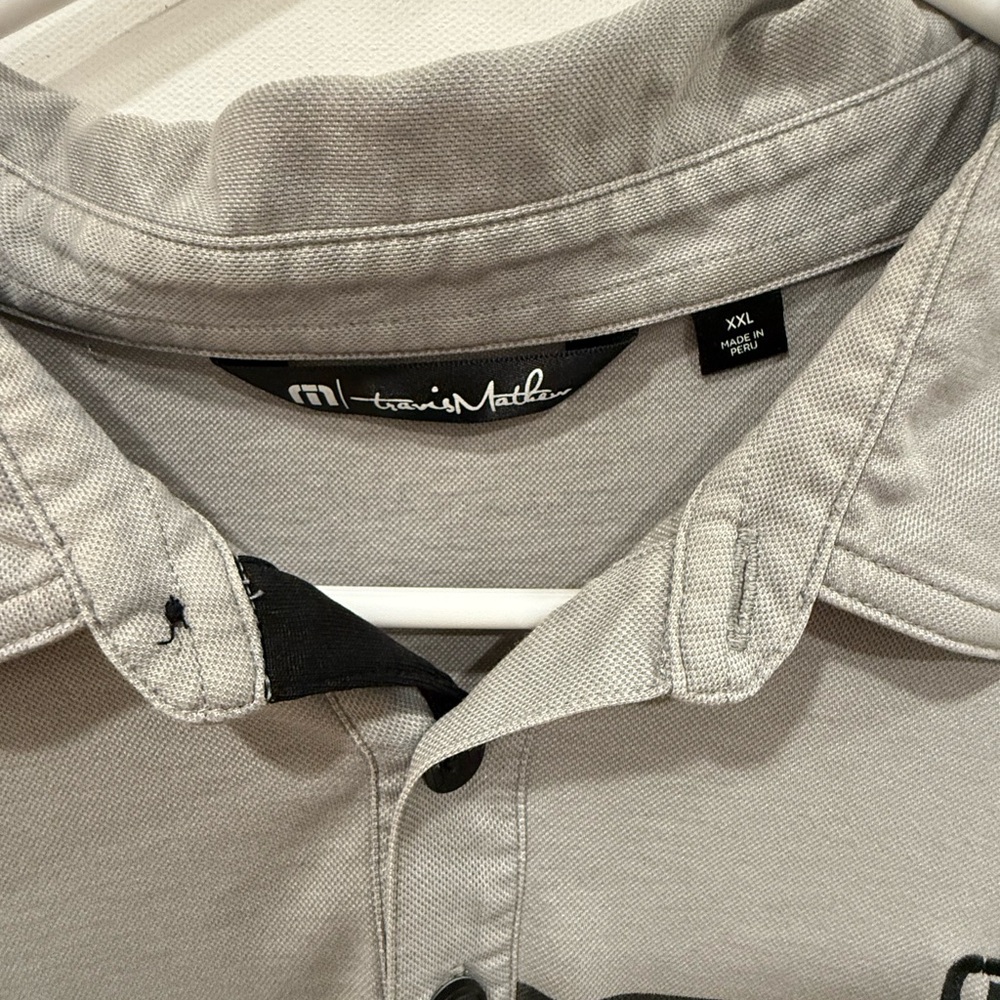 Travis Mathew polo. XXL. Good condition. Black, grey.